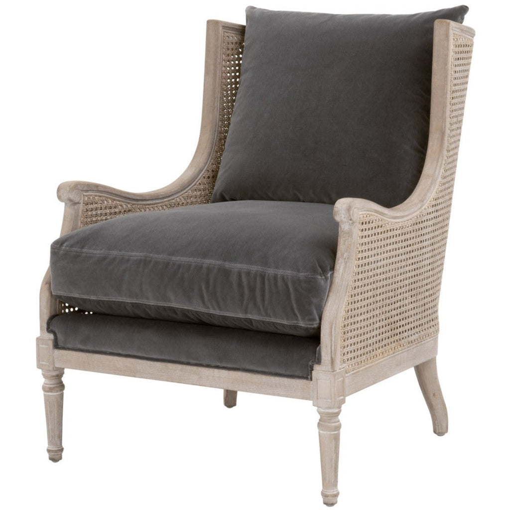 Poltrona Velvet Club - Questa bellissima, con una solida struttura in legno di betulla con rivestimento e dettagli in canna, è perfetta per dare a qualsiasi salotto un tocco unico ma