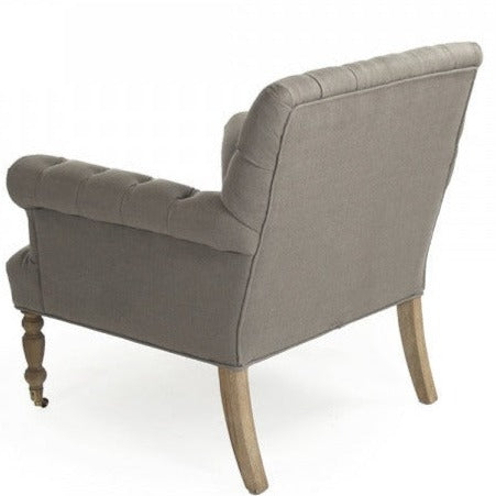Poltrona in lino trapuntato - Realizzata in legno massello di rovere e splendidamente rivestita in lino, il suo elegante design per la casa è ulteriormente accentuato da decorazioni.