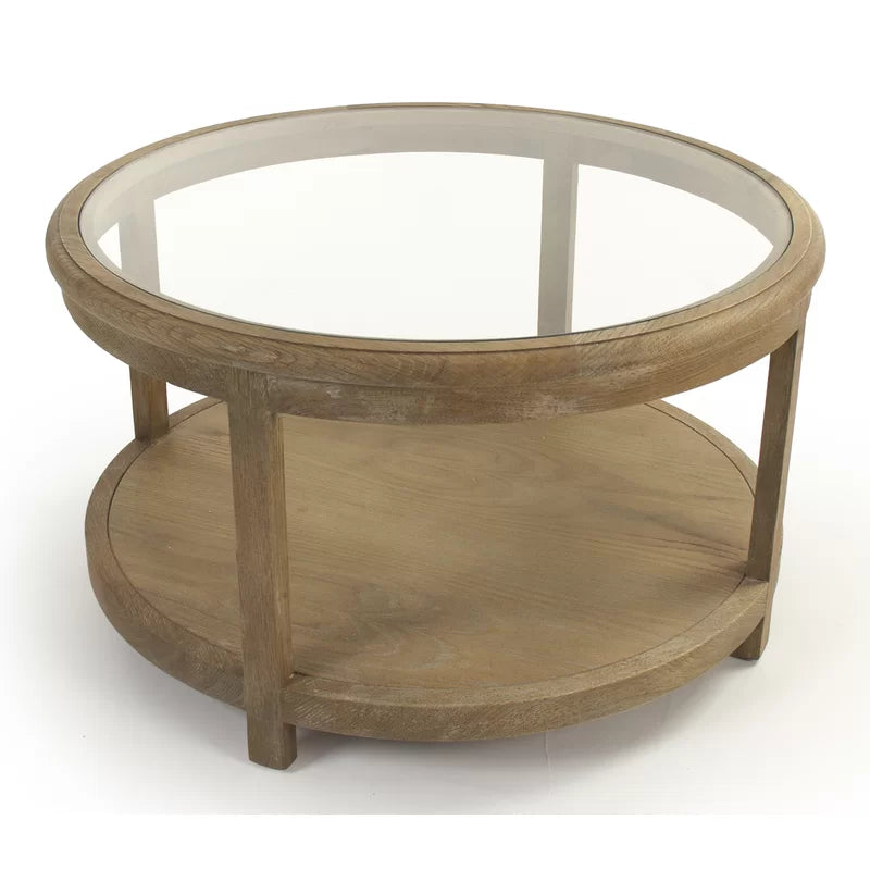 Tavolino da salotto - Questo tavolino rotondo, semplice ma elegante, presenta un piano in vetro e una splendida cornice in legno di quercia che lo rendono una scelta perfetta per aggiungere funzionalità e stil