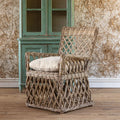 Poltrona in Rattan - Misure 69,85 cm L x 59,69 cm P x 88,9 cm A Rifinitura a mano - Le nostre, caratterizzate da una struttura in stile vintage con un cuscino rivestito neutro, sono su