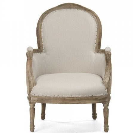 Poltrona Club - Il nostro modello presenta una silhouette a schienale alto in stile rustico, con rivestimento in lino naturale, struttura in rovere naturale e schienale in juta con dettagli borchiati.